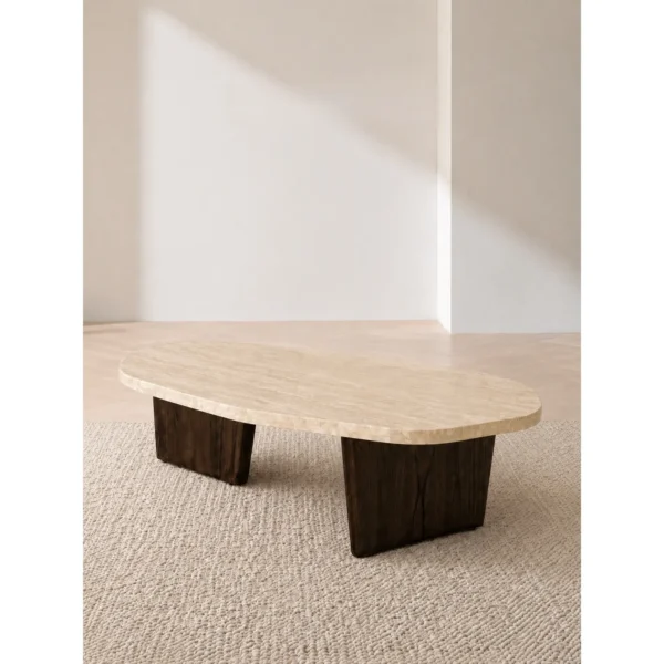 Organic Travertine Coffee Table on Dark Wood Legs in oatmeal — in a room setting