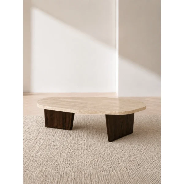 Organic Travertine Coffee Table on Dark Wood Legs in oatmeal — in a room setting