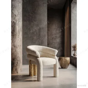 Cream Teddy Tub Chair with Gold Ring on Hammered Brass Legs in oatmeal — in a room setting