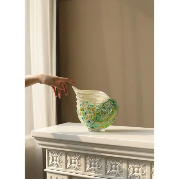 Conch Shell Glass Vase in Green and Yellow, Medium — in a room setting