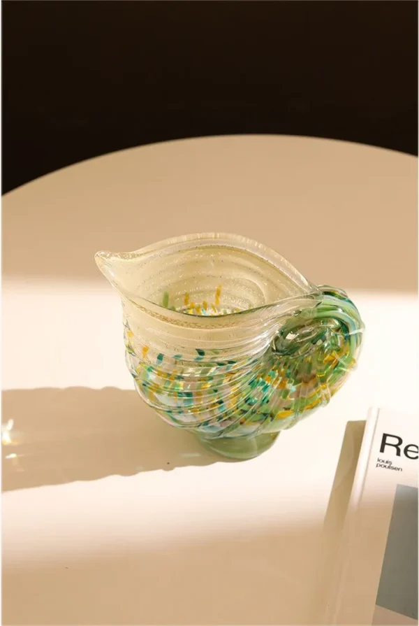 Conch Shell Glass Vase in Green and Yellow, Medium — in a room setting