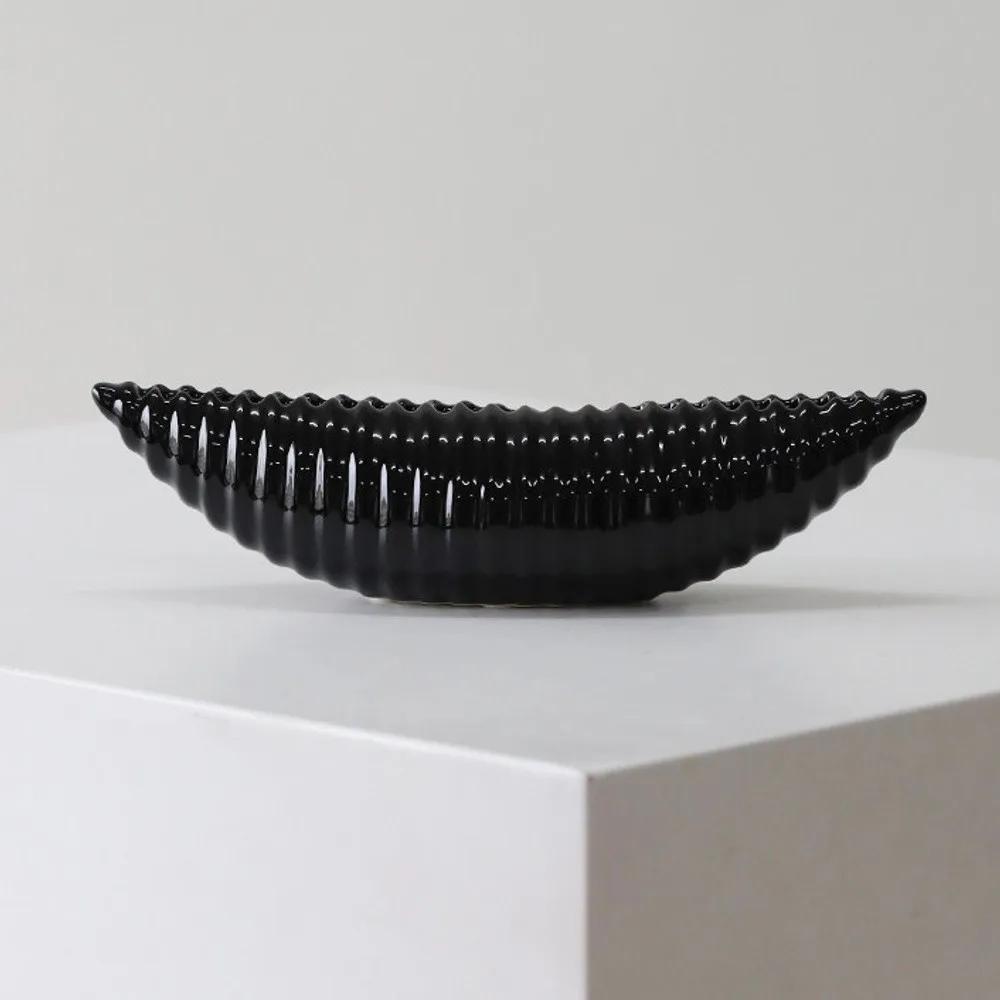 Glossy Black Ribbed Boat Bowl Ornament, Small in black — front view