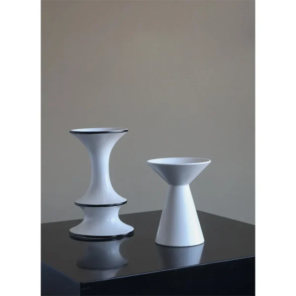 Dancing Form White Ceramic Bud Vases, Three Sizes in ivory — in a room setting