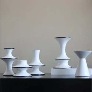 Dancing Form White Ceramic Bud Vases, Three Sizes in ivory — in a room setting