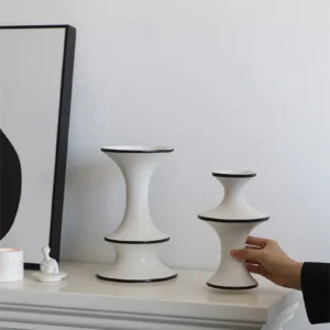 Dancing Form White Ceramic Bud Vases, Three Sizes in ivory — in a room setting