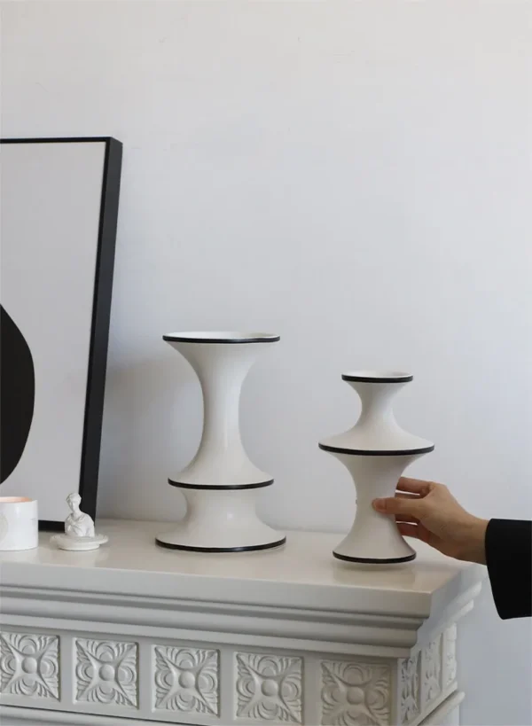 Dancing Form White Ceramic Bud Vases, Three Sizes in ivory — in a room setting