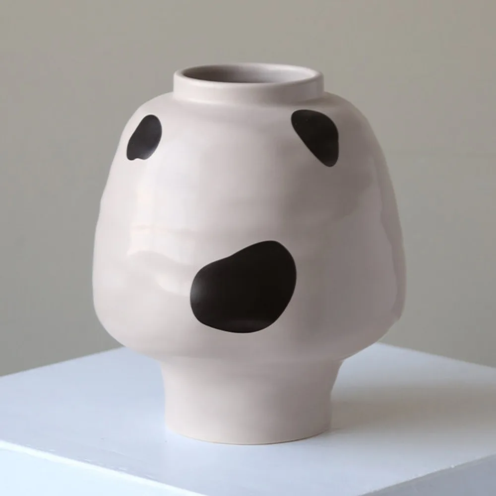 Cream Round-Belly Ceramic Jar in oatmeal — front view
