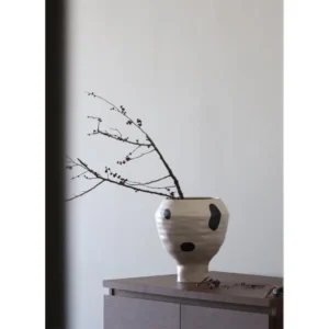 Cream Round-Belly Ceramic Jar in oatmeal — in a room setting