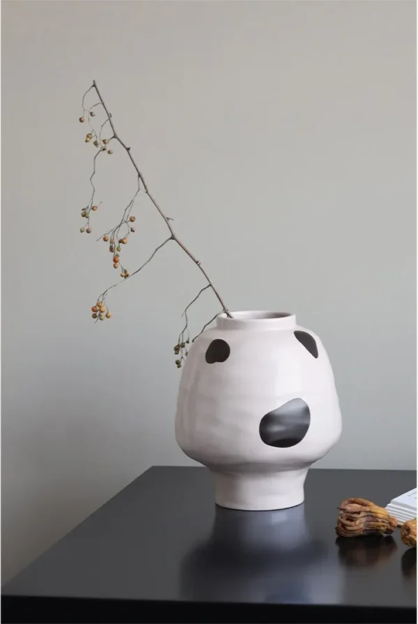 Cream Round-Belly Ceramic Jar in oatmeal — in a room setting