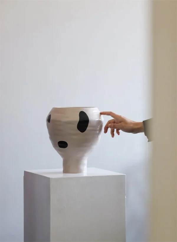 Cream Round-Belly Ceramic Jar in oatmeal — in a room setting