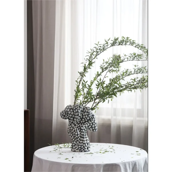 Jingdezhen Black and White Dotted Sculptural Art Vase, Large in black — in a room setting