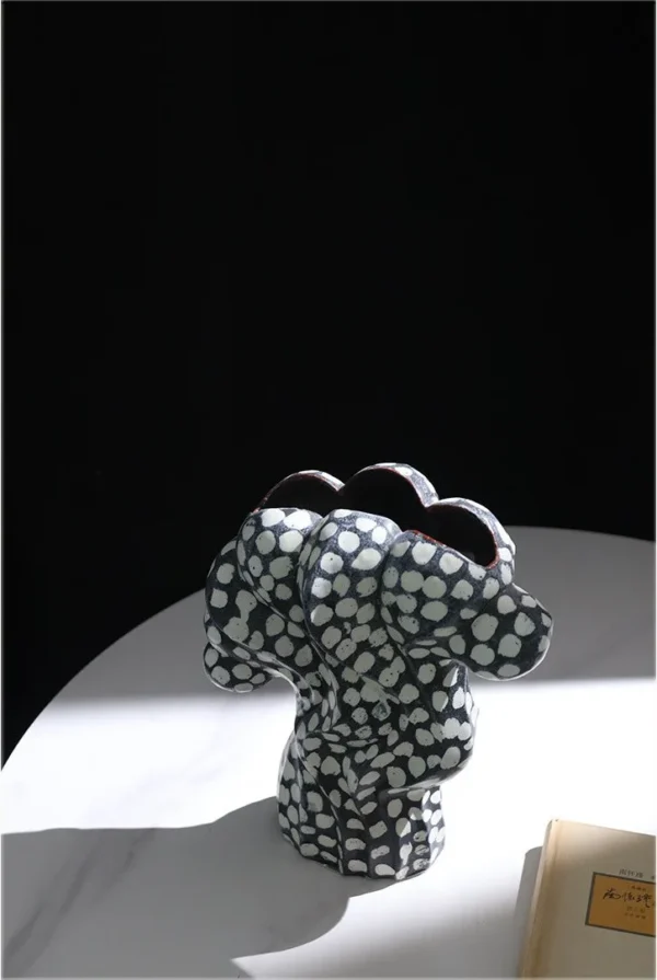 Jingdezhen Black and White Dotted Sculptural Art Vase, Large in black — in a room setting