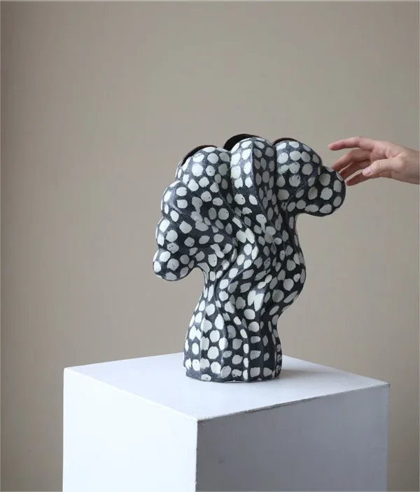 Jingdezhen Black and White Dotted Sculptural Art Vase, Large in black — in a room setting