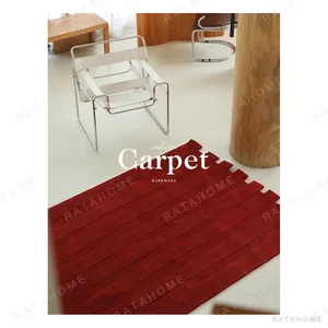 Crimson Corduroy Rug with Notched Ends in red — in a room setting