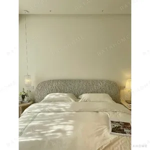 Curved Cotton-Linen Bed with Inset Mattress Frame in sand — in a room setting