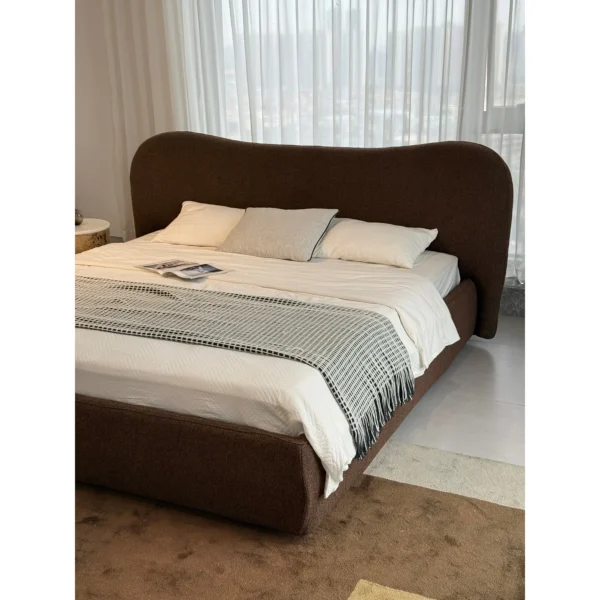 Large Curved Cotton-Linen Bed in Maillard Brown — in a room setting