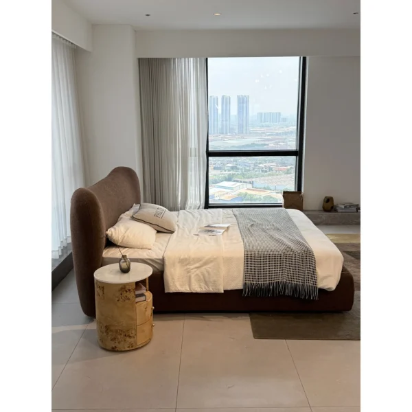 Large Curved Cotton-Linen Bed in Maillard Brown — in a room setting