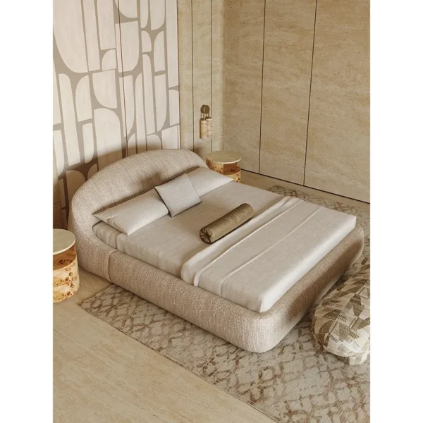 Curved Embrace Linen Bed with Low Surround in oatmeal — in a room setting