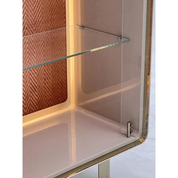 Curved Glass Display Cabinet in sand — in a room setting