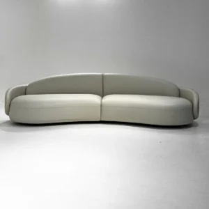 Curved Sofa in Sage Leather and Fabric with Handmade Seams — front view