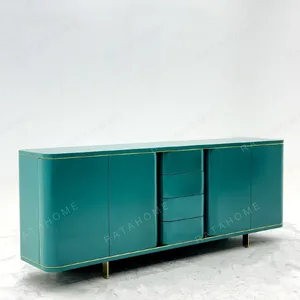 Teal Lacquer Sideboard with Wave Doors and Gold Trim in olive — in a room setting