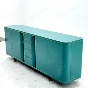 Teal Lacquer Sideboard with Wave Doors and Gold Trim in olive — in a room setting