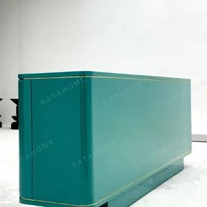 Teal Lacquer Sideboard with Wave Doors and Gold Trim in olive — in a room setting