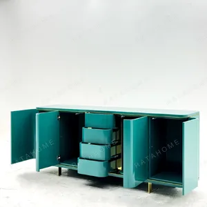 Teal Lacquer Sideboard with Wave Doors and Gold Trim in olive — in a room setting