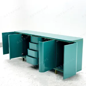 Teal Lacquer Sideboard with Wave Doors and Gold Trim in olive — in a room setting