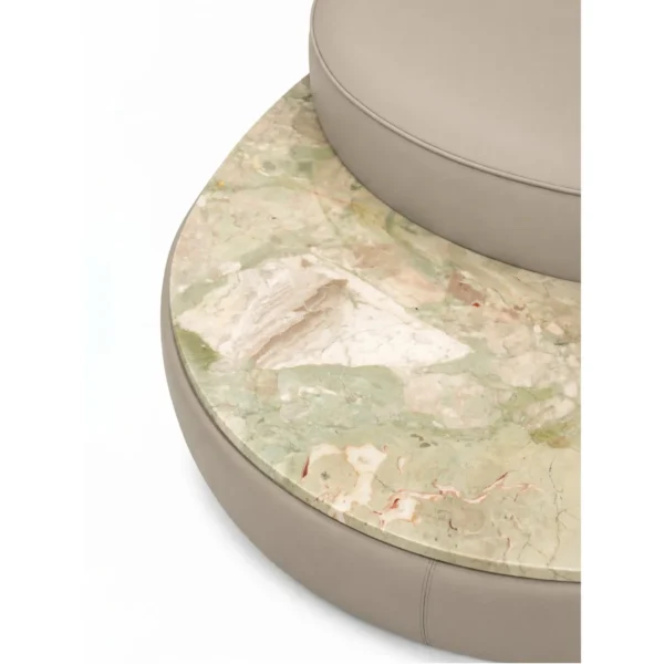 Curved Sofa in Cream Fabric with Natural Stone Side Ledge — in a room setting
