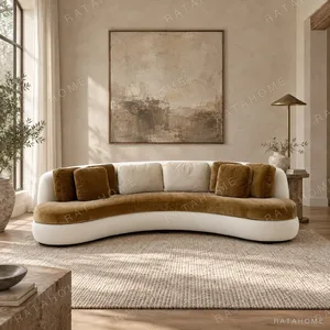 Curved Sofa in Olive Velvet with White Base and Bolster — in a room setting