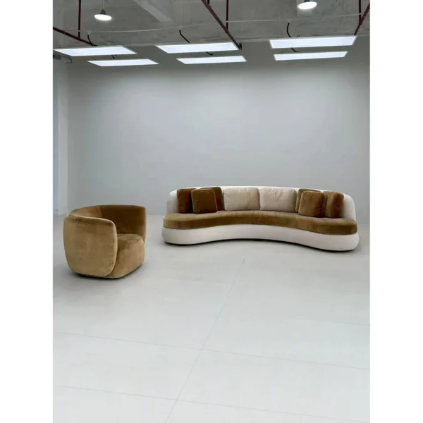 Curved Sofa in Olive Velvet with White Base and Bolster — in a room setting