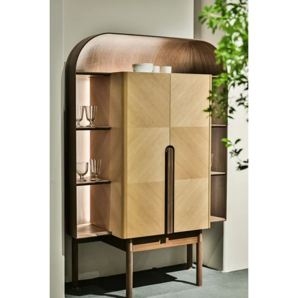 Curved Oak Bar Cabinet with Integrated Light Strip in natural oak — in a room setting