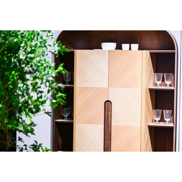 Curved Oak Bar Cabinet with Integrated Light Strip in natural oak — in a room setting