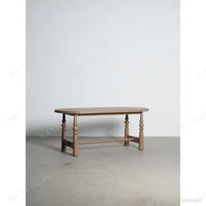 Custom-Colour Oval Oak Table with Turned Legs in natural oak — in a room setting