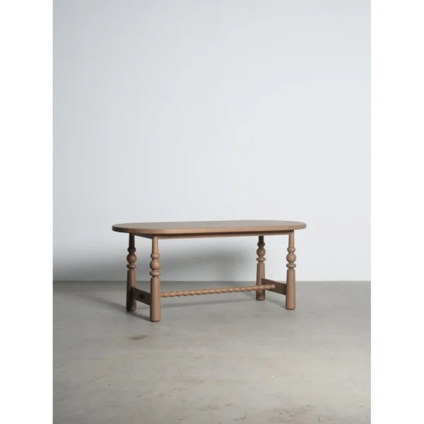 Custom-Colour Oval Oak Table with Turned Legs in natural oak — in a room setting
