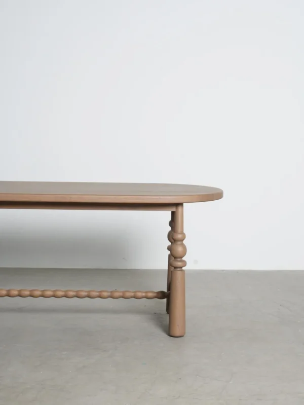 Custom-Colour Oval Oak Table with Turned Legs in natural oak — in a room setting