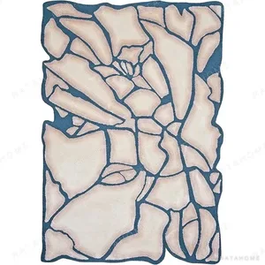 Custom Cracked Stone Rug in Cream, Blush and Teal — in a room setting