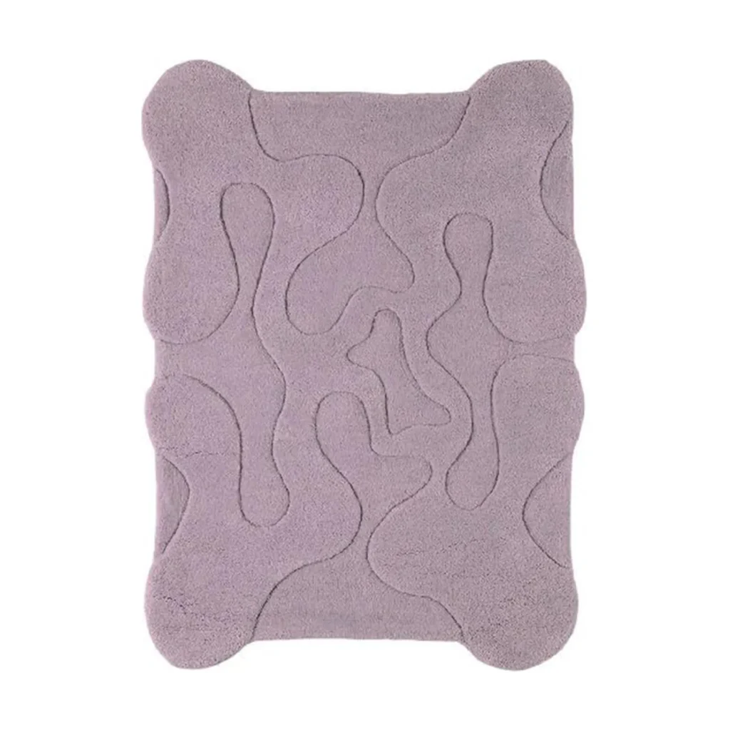 Custom Lilac Relief Rug with Wavy Edge in plum — front view