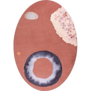 Custom Oval Rug in Terracotta with Ring and Blossom — in a room setting