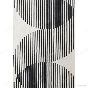 Custom Striped Arc Rug in Black and Cream — in a room setting