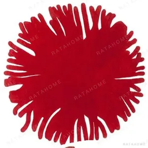 Custom Red Pom-Pom Round Rug with Fringed Edge in red — in a room setting