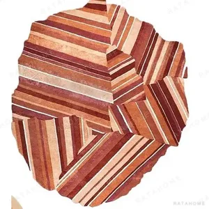 Custom Striped Patchwork Rug in Rust, Cream and Plum — in a room setting