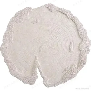 Custom Tree Ring Rug in Cream with Bark Edge — in a room setting