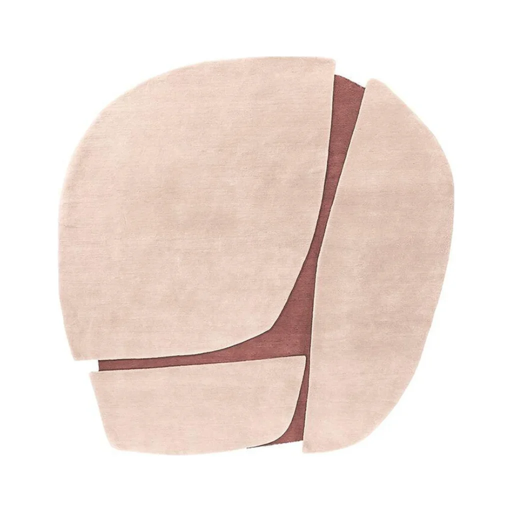 Custom Blush Rounded Rug with Plum Seams in rose stone — front view
