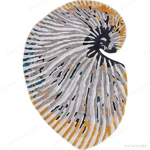 Custom Nautilus Shell Rug in Cream, Grey and Amber — in a room setting