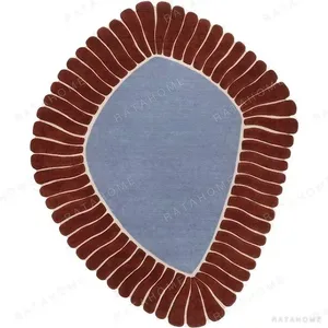 Custom Anemone Rug in Blue with Burgundy Tentacle Edge — in a room setting