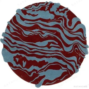Custom Marbled Round Rug in Burgundy and Sky Blue — in a room setting