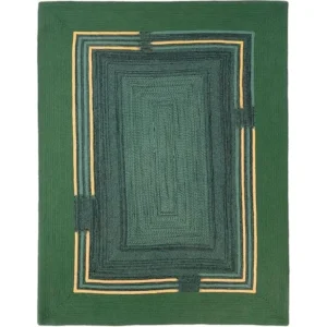 Custom Forest Green Braided Rug with Yellow Line Frame in olive — in a room setting