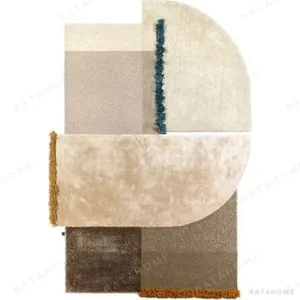 Custom Layered Arc Rug in sand — in a room setting